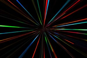 a black background with colorful lines in the middle